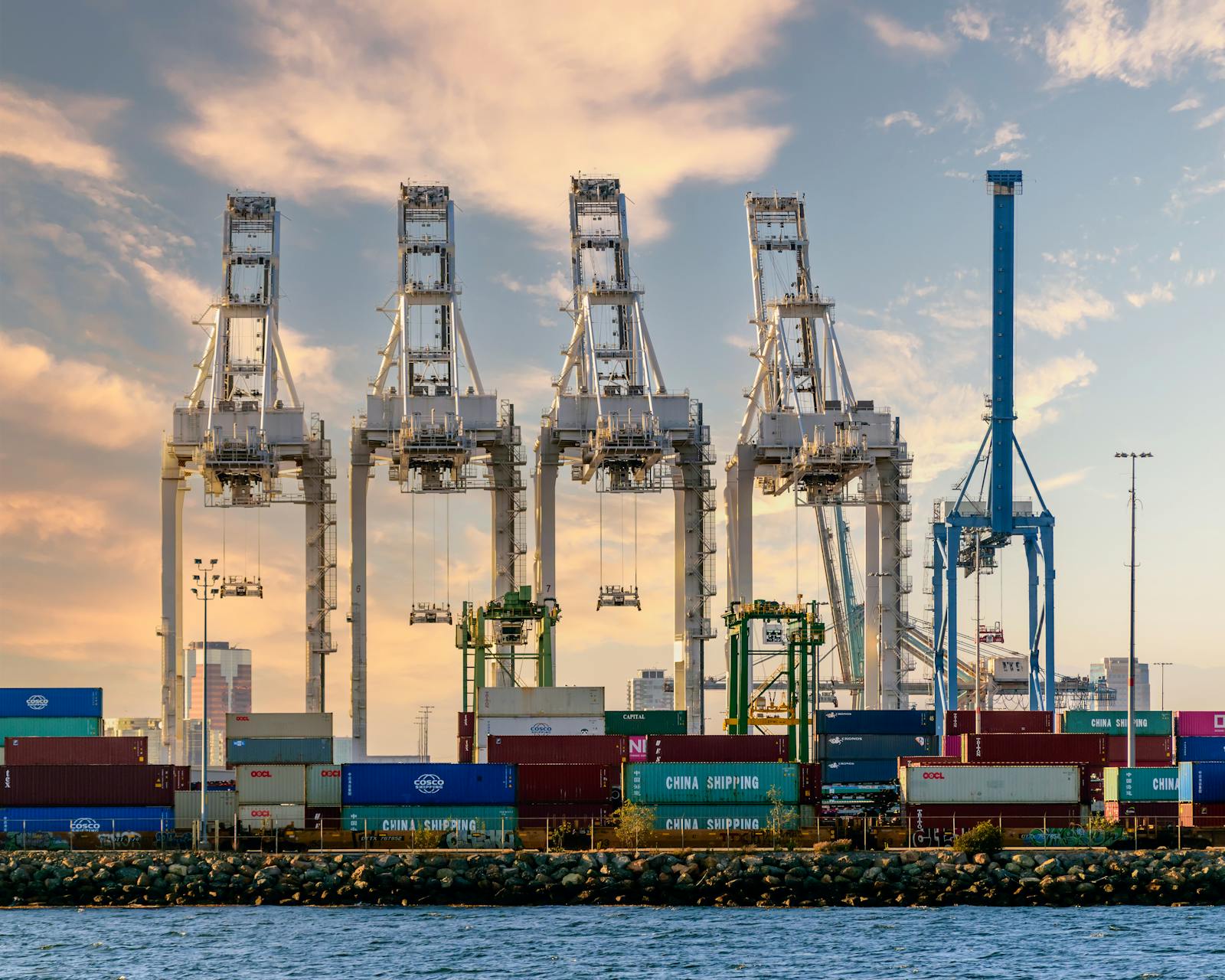 Container cranes and port infrastructure supporting cross-border distribution